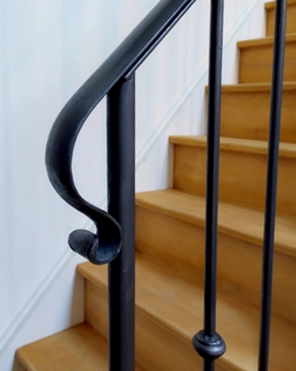 Gros plan sur volute de main courante